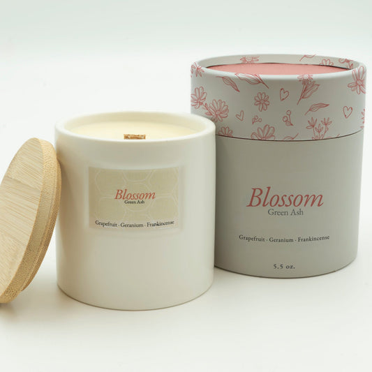 Blossom jar open showing wax and wooden wick.